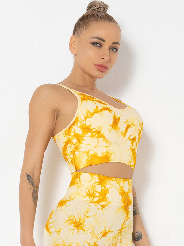 Stylish women's printed sports bra in yellow, perfect for yoga and activewear. Lightweight nylon material for comfort and breathability.